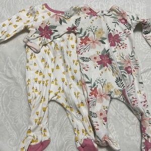 Infant 0-3 month sleeper onesies.